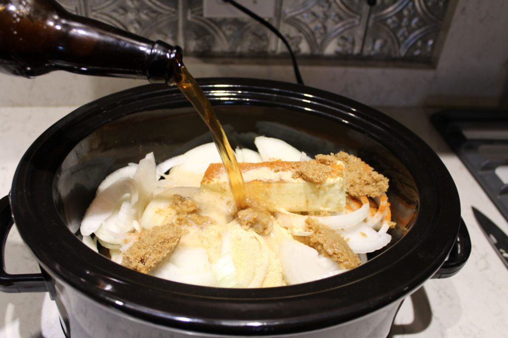 Pour the dark beer into the Crock Pot