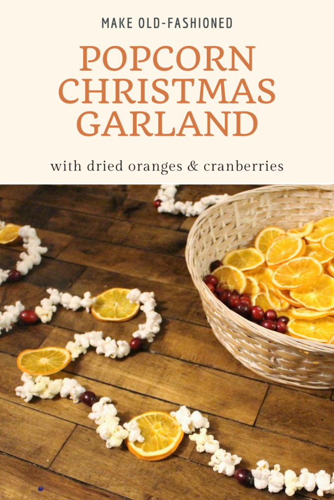 make old fashioned popcorn christmas garland with oranges and cranberries pin