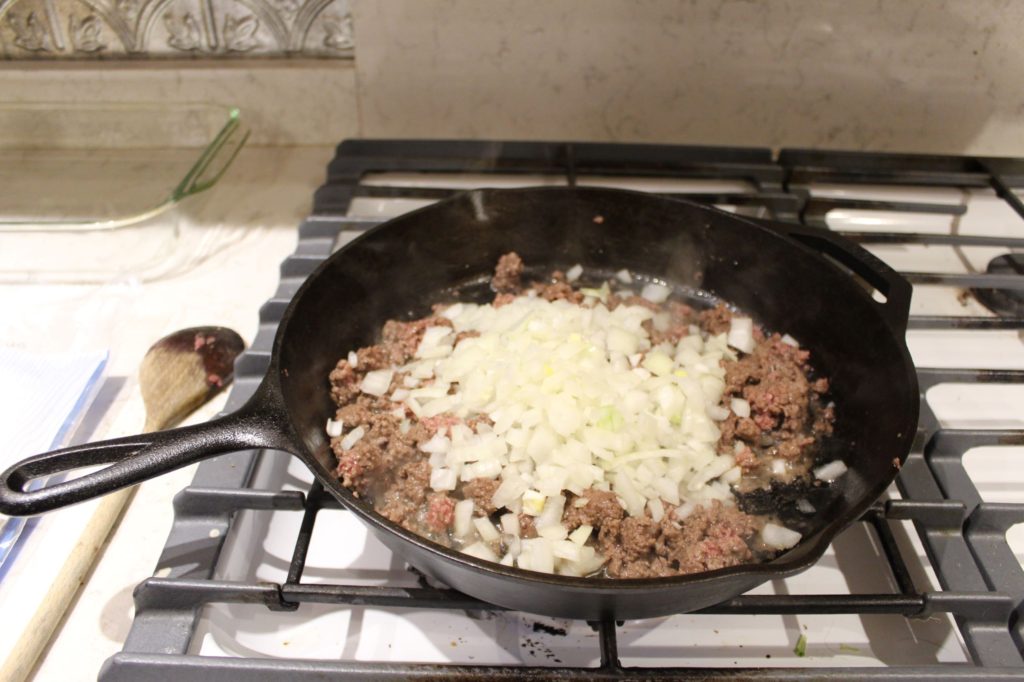 add onions to browned ground beef