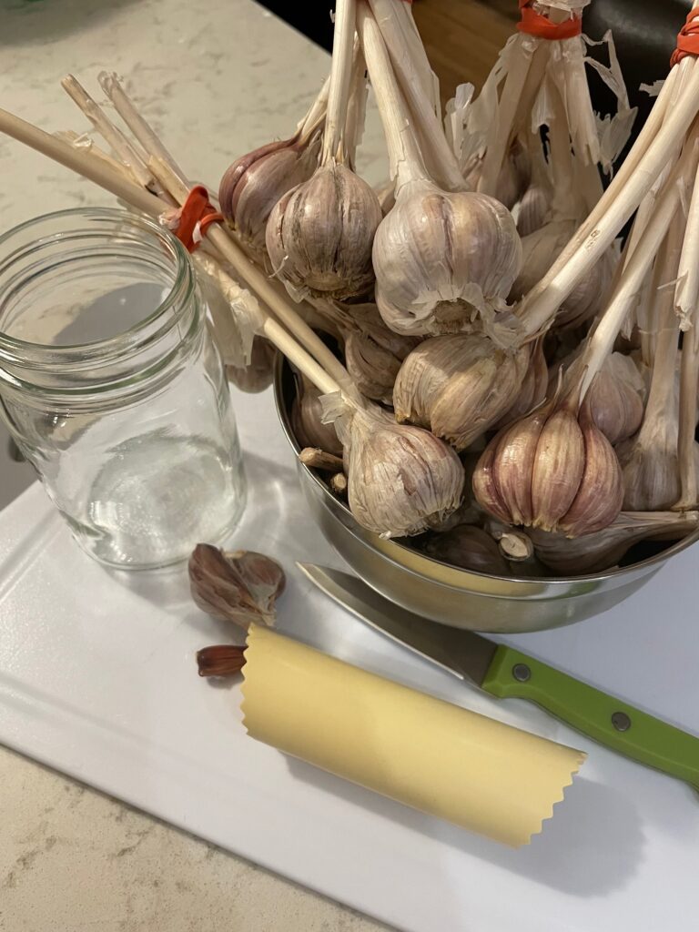 Gather your garlic cutting and peeling supplies