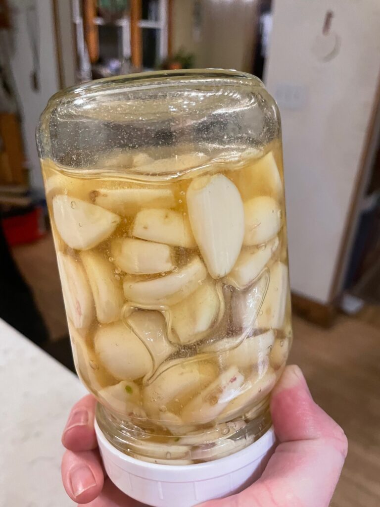 flip your jar to mix the honey and garlic together